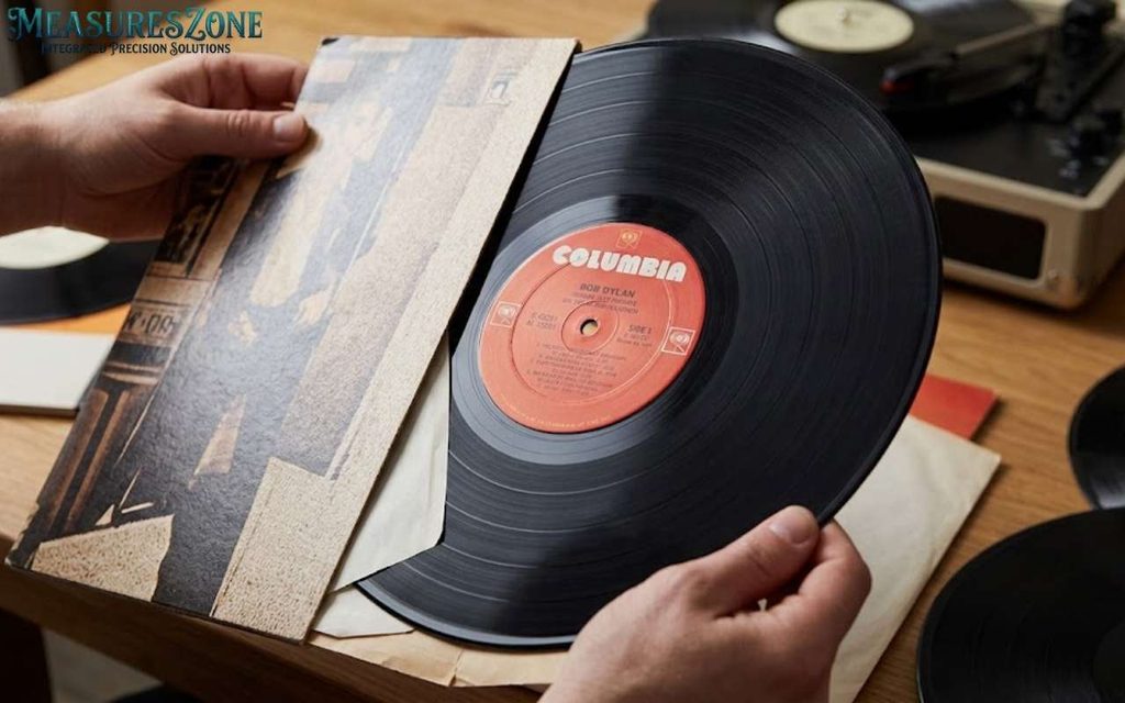 12-inch Bob Dylan vinyl record with a red Columbia label.